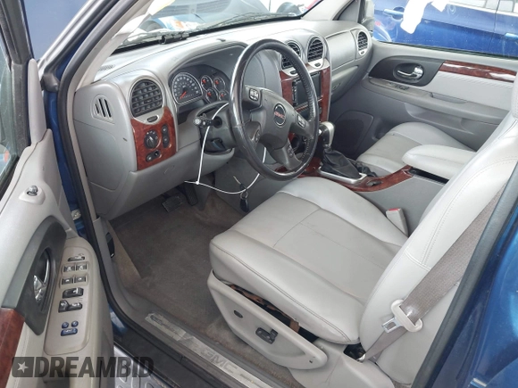 2006 GMC Envoy SLE with VIN 1GKDS13S562252049, listed as a IAAI auction lot 41940052 with 149,445 mi miles. Bid and sale history available at carsss.com. Image 5.