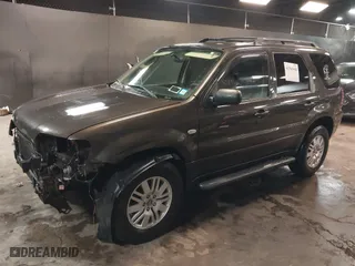 2005 Mercury Mariner Luxury with VIN 4M2YU57115DJ31547, listed as a IAAI auction lot 41565468 with 68,061 mi miles. Bid and sale history available at carsss.com. Image 19.