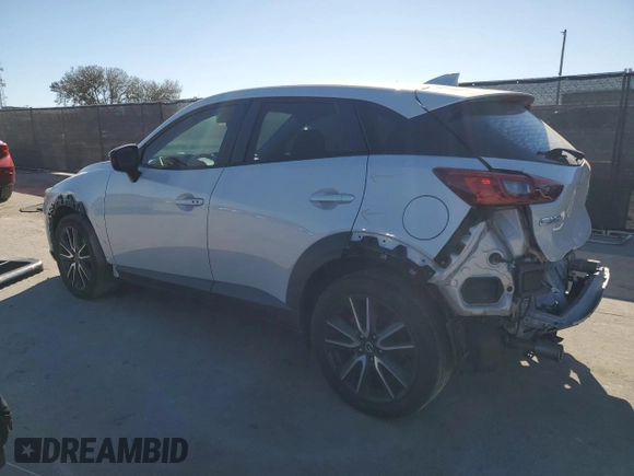 2018 Mazda CX-3 Touring with VIN JM1DKDC77J0305749, listed as a Copart auction lot 86524474 with 112,562 mi miles and Salvage Title. Bid and sale history available at DreamBid. Image 2.