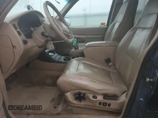 2000 Ford Explorer Eddie Bauer with VIN 1FMZU74E3YZA26797, listed as a Copart auction lot 53163865 with 297,314 mi miles and Clean title. Bid and sale history available at DreamBid. Image 7.