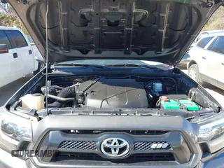 2014 Toyota Tacoma PreRunner with VIN 5TFJU4GN3EX057731, listed as a IAAI auction lot 41703750 with 110,321 mi miles. Bid and sale history available at carsss.com. Image 10.