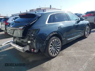 2019 Audi e-tron Prestige with VIN WA1VAAGE2KB021539, listed as a IAAI auction lot 42007353 with 14,238 mi miles and . Bid and sale history available at DreamBid. Image 4.