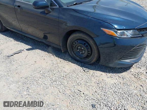 2019 Toyota Camry LE z VIN 4T1B11HK7KU269928, wystawiony jako IAAI lot #42048750 z przebiegiem 102 585 mil mil oraz . Historia ofert i sprzedaży dostępna na DreamBid. Obrazek 6.