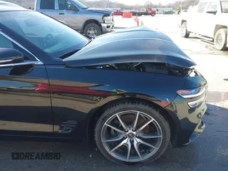 2022 Genesis G70 2.0T z VIN KMTG34TA0NU098580, wystawiony jako IAAI lot #41763511 z przebiegiem 87 816 mil mil oraz . Historia ofert i sprzedaży dostępna na DreamBid. Obrazek 18.