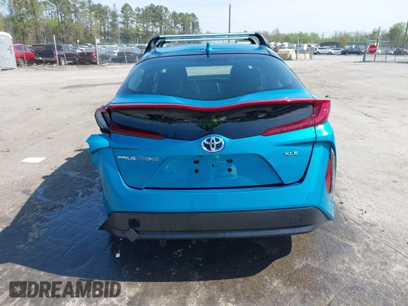 2021 Toyota Prius LE with VIN JTDKAMFP7M3180504, listed as a IAAI auction lot 41985409 with 56,617 mi miles and . Bid and sale history available at DreamBid. Image 16.