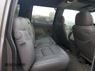 1999 GMC Suburban z VIN 3GKEC16R4XG536985, wystawiony jako Copart lot #73421824 z przebiegiem 181 327 mil mil oraz Tytuł czysty. Historia ofert i sprzedaży dostępna na DreamBid. Obrazek 10.