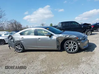 2015 Mazda 6 i Grand Touring with VIN JM1GJ1W52F1195333, listed as a IAAI auction lot 42014865 with 107,039 mi miles and . Bid and sale history available at DreamBid. Image 12.