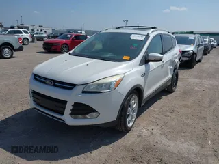 2015 Ford Escape Titanium with VIN 1FMCU0JX4FUB07322, listed as a IAAI auction lot 42220345 with 184,852 mi miles and . Bid and sale history available at DreamBid. Image 17.