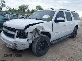 2013 Chevrolet Suburban LT with VIN 1GNSCJE05DR147101, listed as a IAAI auction lot 42336950 with 147,429 mi miles and . Bid and sale history available at DreamBid. Image 18.