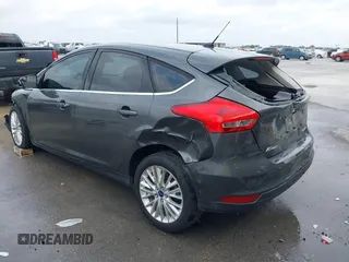 2017 Ford Focus Titanium with VIN 1FADP3N20HL210364, listed as a IAAI auction lot 42130643 with 132,312 mi miles and . Bid and sale history available at DreamBid. Image 3.