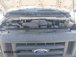 2012 Ford Econoline Cargo Commercial with VIN 1FTNE1EW3CDA86220, listed as a IAAI auction lot 41463546 with 250,381 mi miles and . Bid and sale history available at carsss.com. Image 10.