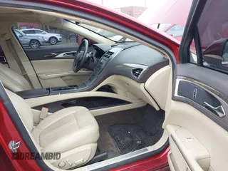 2013 Lincoln MKZ z VIN 3LN6L2G95DR806631, wystawiony jako IAAI lot #42663137 z przebiegiem 167 646 mil mil oraz . Historia ofert i sprzedaży dostępna na DreamBid. Obrazek 5.