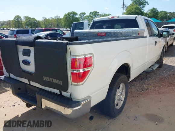 2013 Ford F-150 XL with VIN 1FTFX1CF3DKF37810, listed as a IAAI auction lot 41970478 with 211,781 mi miles. Bid and sale history available at carsss.com. Image 4.