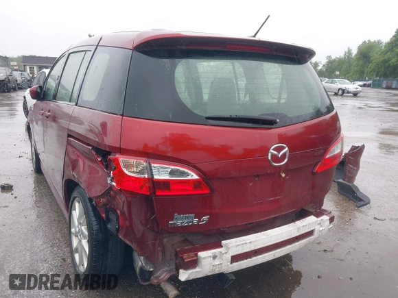 2012 Mazda 5 Grand Touring with VIN JM1CW2DL8C0142628, listed as a IAAI auction lot 42350676 with 84,764 mi miles and . Bid and sale history available at DreamBid. Image 6.