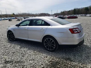 2018 Ford Taurus SEL with VIN 1FAHP2E87JG137928, listed as a Copart auction lot 53438695 with 56,874 mi miles and Salvage title. Bid and sale history available at DreamBid. Image 2.