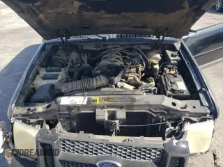 2003 Ford Explorer Sport XLS z VIN 1FMYU60E93UC12832, wystawiony jako Copart lot #71596394 z przebiegiem 197 215 mil mil oraz Szkody całkowita. Historia ofert i sprzedaży dostępna na DreamBid. Obrazek 12.