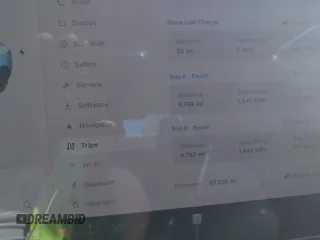 2019 Tesla Model 3 Mid Range with VIN 5YJ3E1EA7KF425127, listed as a IAAI auction lot 41886436 with 87,236 mi miles and . Bid and sale history available at carsss.com. Image 7.