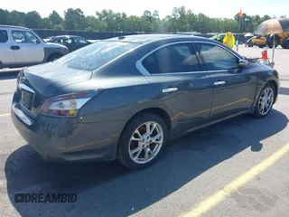 2013 Nissan Maxima SV with VIN 1N4AA5AP5DC815847, listed as a IAAI auction lot 42758399 with 168,056 mi miles and . Bid and sale history available at DreamBid. Image 4.