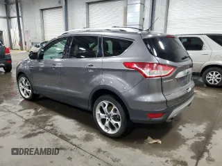 2014 Ford Escape Titanium with VIN 1FMCU9J95EUA29945, listed as a Copart auction lot 51353335 with 238,458 mi miles and Salvage Title. Bid and sale history available at carsss.com. Image 2.