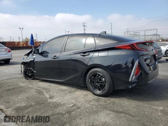 2021 Toyota Prius LE with VIN JTDKAMFP6M3169879, listed as a Copart auction lot 50259775 with 43,173 mi miles and Salvage Title. Bid and sale history available at DreamBid. Image 2.