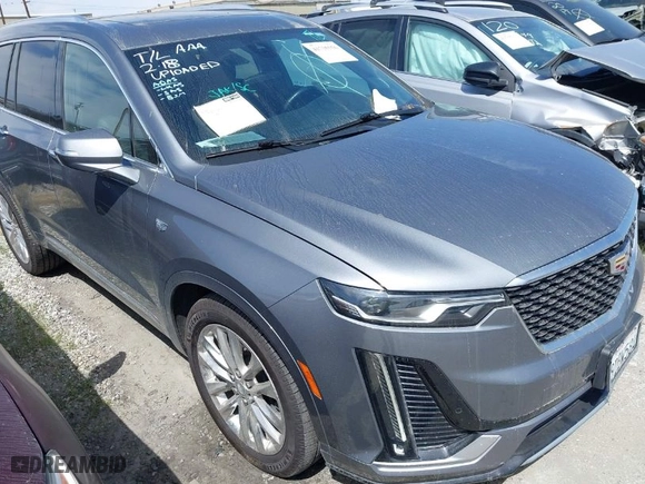 2020 Cadillac XT6 FWD Premium Luxury with VIN 1GYKPCRSXLZ105231, listed as a IAAI auction lot 41735556 with 70,319 mi miles. Bid and sale history available at carsss.com. Image 1.