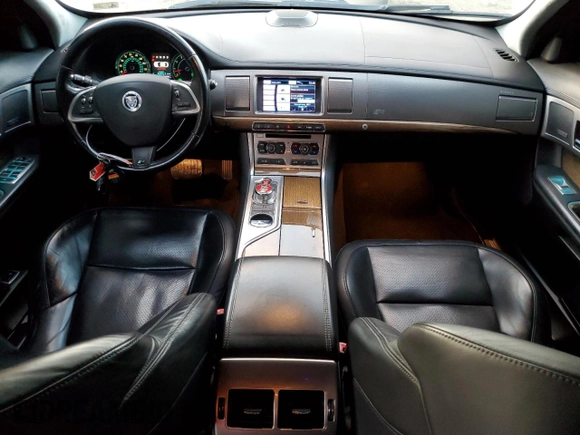 2013 Jaguar XF with VIN SAJWA0JC4DMS64094, listed as a Copart auction lot 80721014 with 133,462 mi miles and Salvage Title. Bid and sale history available at DreamBid. Image 8.