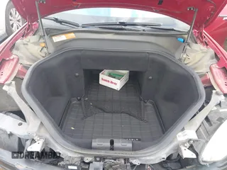 2013 Tesla Model S with VIN 5YJSA1CN1DFP09756, listed as a IAAI auction lot 41921720 with 94,770 mi miles. Bid and sale history available at carsss.com. Image 10.