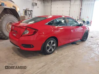 2020 Honda Civic LX with VIN 2HGFC2F63LH507310, listed as a IAAI auction lot 42180914 with 54,599 mi miles and . Bid and sale history available at DreamBid. Image 4.