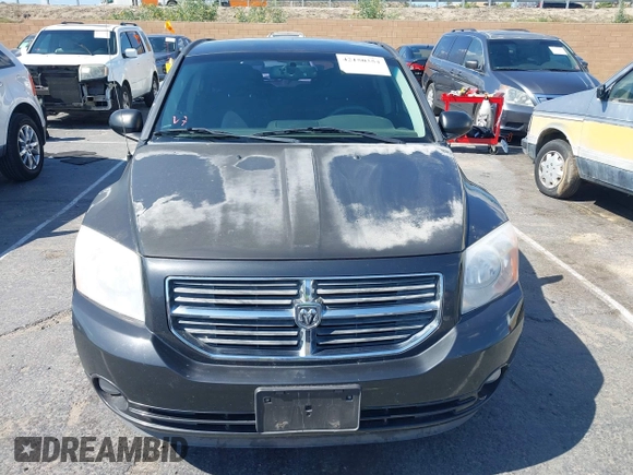 2011 Dodge Caliber Mainstreet with VIN 1B3CB3HA9BD120950, listed as a IAAI auction lot 42150354 with 103,015 mi miles. Bid and sale history available at carsss.com. Image 6.