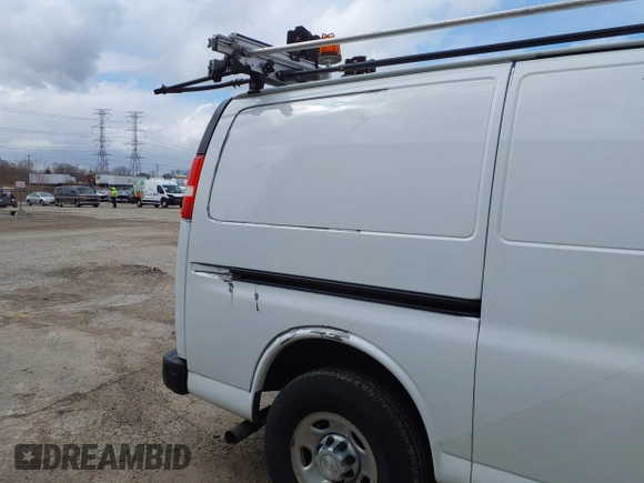 2018 Chevrolet Express Cargo Van with VIN 1GCWGAFP1J1322142, listed as a IAAI auction lot 41952498 with 155,218 mi miles. Bid and sale history available at carsss.com. Image 6.