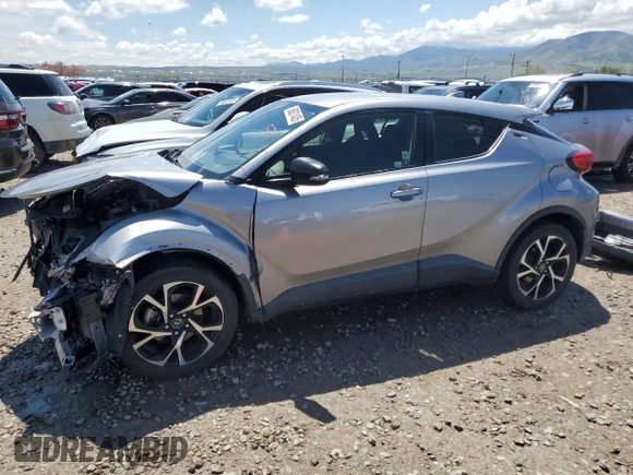 2018 Toyota C-HR XLE with VIN JTNKHMBX4J1003588, listed as a Copart auction lot 56021405 with 34,416 mi miles and Salvage title. Bid and sale history available at DreamBid. Image 1.