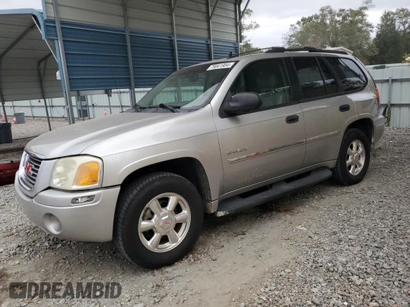 2006 GMC Envoy SLT with VIN 1GKDS13S062186025, listed as a Copart auction lot 79041904 with 220,053 mi miles and Salvage Title. Bid and sale history available at carsss.com. Image 1.
