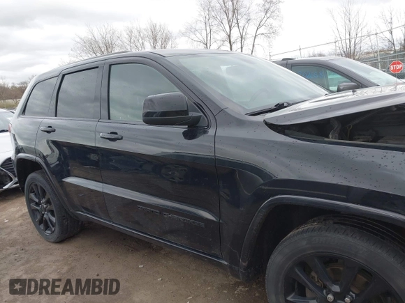 2017 Jeep Grand Cherokee Laredo with VIN 1C4RJFAG7HC886640, listed as a IAAI auction lot 42035301 with 197,110 mi miles. Bid and sale history available at carsss.com. Image 14.