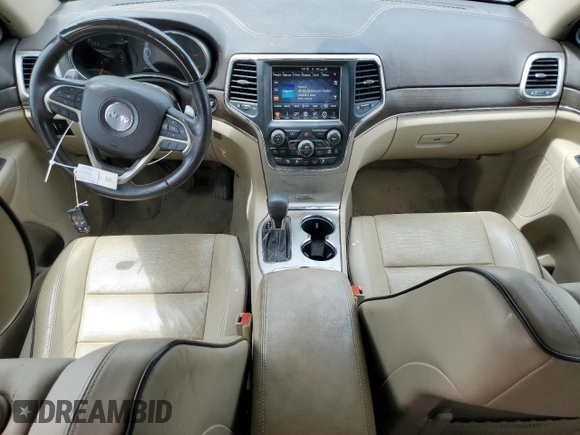 2017 Jeep Grand Cherokee Overland с VIN 1C4RJFCG4HC694654, выставлен на аукционе Copart как лот 60788645 с пробегом 155 642 миль миль и Списание • Salvage title. История ставок и продаж доступна на DreamBid. Изображение 8.