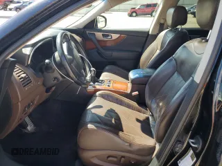 2011 Infiniti FX with VIN JN8AS1MW8BM734582, listed as a Copart auction lot 56852125 with 140,507 mi miles and Salvage title. Bid and sale history available at DreamBid. Image 7.