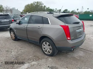 2012 Cadillac SRX Luxury Collection z VIN 3GYFNAE35CS509402, wystawiony jako IAAI lot #41765970 z przebiegiem 157 082 mil mil oraz . Historia ofert i sprzedaży dostępna na DreamBid. Obrazek 3.