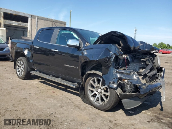 2021 GMC Canyon 4WD Denali with VIN 1GTG6EEN9M1255163, listed as a Copart auction lot 59868834 with 63,853 mi miles and Salvage Title. Bid and sale history available at carsss.com. Image 4.