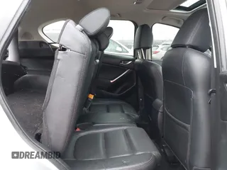 2016 Mazda CX-5 Grand Touring with VIN JM3KE4DY4G0712465, listed as a IAAI auction lot 41859217 with 61,806 mi miles and . Bid and sale history available at carsss.com. Image 8.