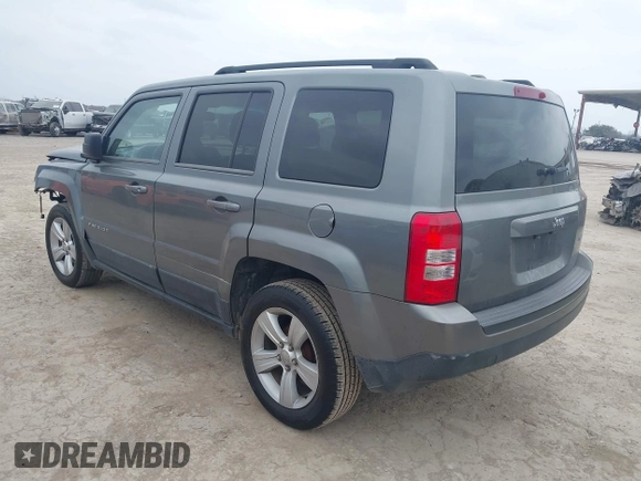 2014 Jeep Patriot Latitude with VIN 1C4NJPFAXED507693, listed as a IAAI auction lot 41701193 with 104,130 mi miles and . Bid and sale history available at DreamBid. Image 3.