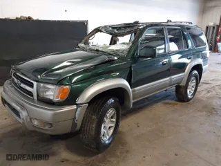 1999 Toyota 4Runner Limited with VIN JT3HN87R5X0259170, listed as a IAAI auction lot 41637389 with 146,224 mi miles. Bid and sale history available at carsss.com. Image 2.