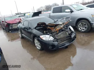 2007 Mitsubishi Eclipse SE with VIN 4A3AK64F77E072243, listed as a IAAI auction lot 41656069 with 164,174 mi miles. Bid and sale history available at carsss.com. Image 1.