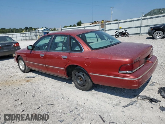 1997 Ford Crown Victoria LX с VIN 2FALP74W7VX148869, выставлен на аукционе Copart как лот 69004924 с пробегом 226 648 миль миль и Списание • Salvage title. История ставок и продаж доступна на DreamBid. Изображение 2.