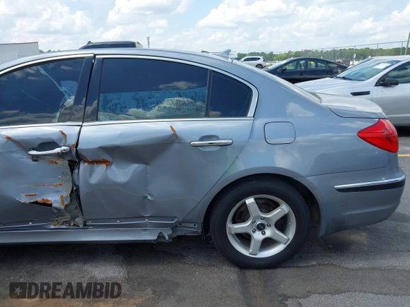 2013 Hyundai Genesis 3.8L with VIN KMHGC4DD1DU256345, listed as a IAAI auction lot 42187431 with 117,528 mi miles and . Bid and sale history available at DreamBid. Image 19.