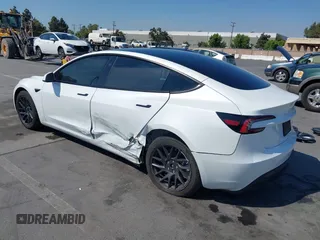 2025 Tesla Model 3 Long Range with VIN 5YJ3E1EB3SF914858, listed as a IAAI auction lot 42719707 with 5,849 mi miles and . Bid and sale history available at DreamBid. Image 3.