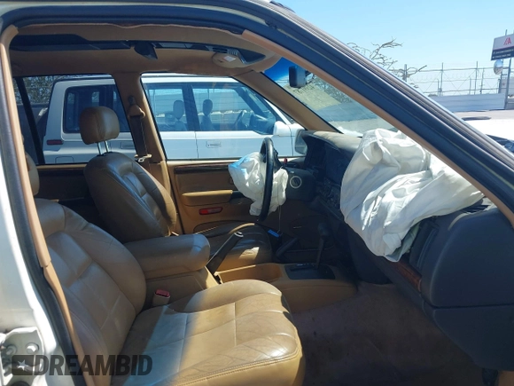 1996 Jeep Grand Cherokee Limited с VIN 1J4GZ78YXTC378363, выставлен на аукционе IAAI как лот 42391787 с пробегом 129 921 миль миль и . История ставок и продаж доступна на DreamBid. Изображение 5.