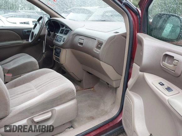 2002 Toyota Sienna CE with VIN 4T3ZF19C12U438162, listed as a IAAI auction lot 41725040 with 241,080 mi miles. Bid and sale history available at carsss.com. Image 5.