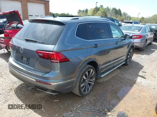 2018 Volkswagen Tiguan SEL Premium with VIN 3VV5B7AX4JM201579, listed as a IAAI auction lot 41932201 with 118,728 mi miles and . Bid and sale history available at DreamBid. Image 4.