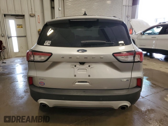 2020 Ford Escape SEL with VIN 1FMCU9H69LUA37233, listed as a Copart auction lot 54619895 with 84,174 mi miles and Salvage title. Bid and sale history available at DreamBid. Image 6.