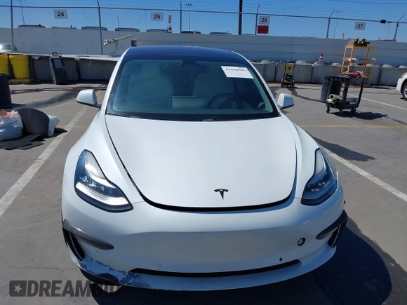 2019 Tesla Model 3 Mid Range with VIN 5YJ3E1EA5KF327181, listed as a IAAI auction lot 41860943 with 157,335 mi miles and . Bid and sale history available at DreamBid. Image 12.