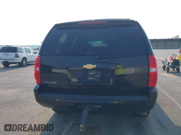 2014 Chevrolet Tahoe LT with VIN 1GNSCBE01ER235571, listed as a IAAI auction lot 42403118 with 238,069 mi miles and . Bid and sale history available at DreamBid. Image 16.
